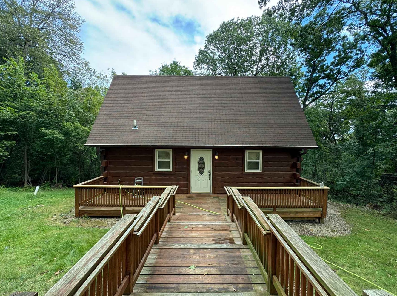 Deck Restoration 4 A Cabin With A Deck Near The Trees