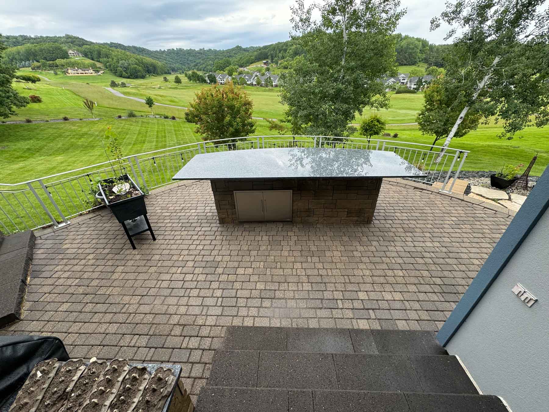 Patio Cleaning 31 Patio Behind A House After It Has Been Cleaned By Driftless Exteriors