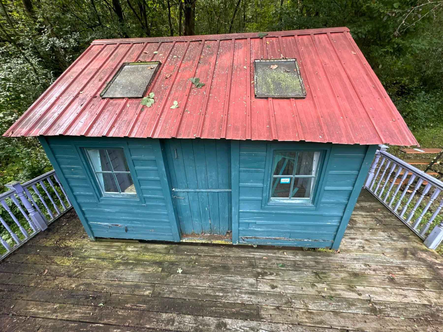 House Washing 24 Small Hut Before Being Cleaned By Driftless Exteriors